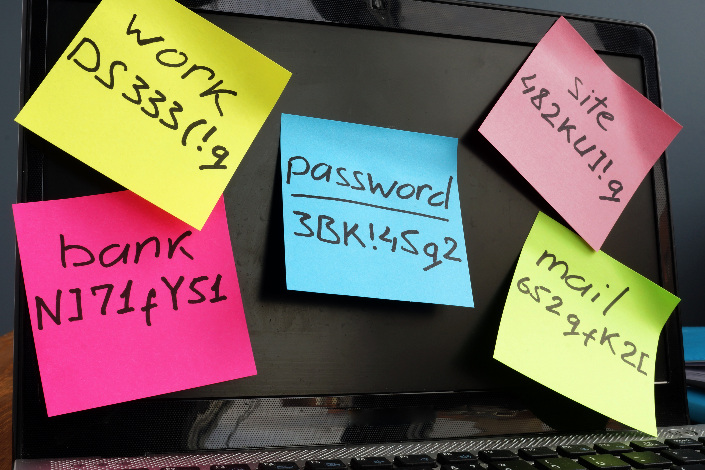sticky notes with various passwords